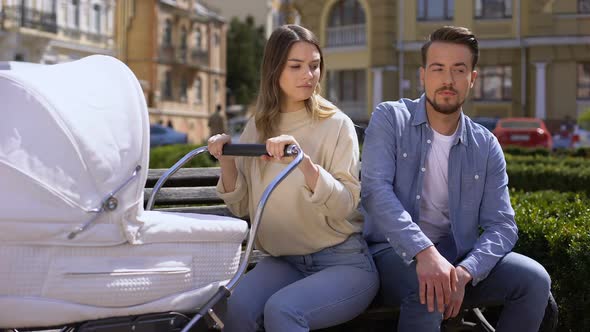 Young Husband Looking at Women on Street, Jealous Wife Crying Swinging Pram