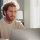 Man Using Laptop at Home - VideoHive Item for Sale