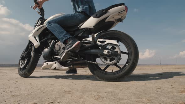 Man Biker Doing Tire Burnout in the Desert Slow Motion