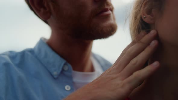 Passionate Couple Enjoying Caresses in Mountains Closeup