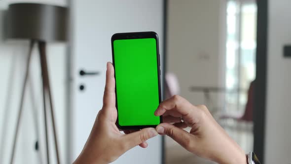 POV of Green Mockup Screen Chroma Key Mochup Screen on Mobile Phone