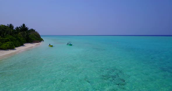 Natural aerial clean view of a paradise sunny white sand beach and blue sea background in colorful 4