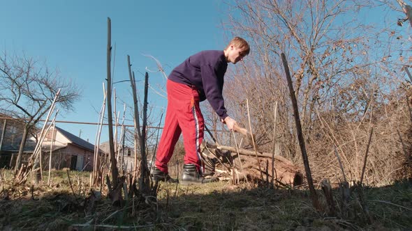 Man Chopping Wood Slow Motion