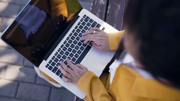 Female Hands Typing on Computer Keyboard