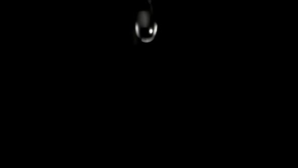 Slow Motion Drop Water In Black background