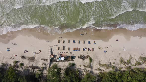 People are resting on the beach of the Baltic Sea