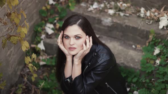 Beautiful Woman Sitting on a Staircase