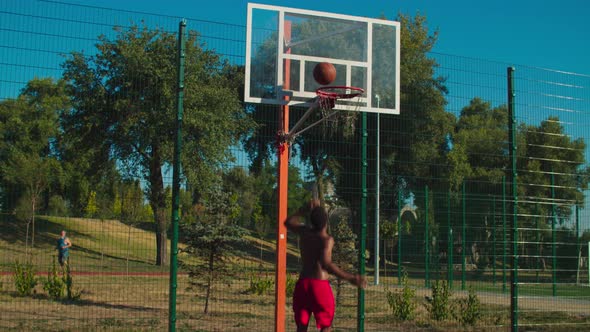 Basketball Player Scoring After Teammate Assist