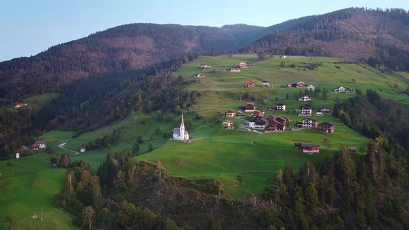 Aerial View of Villas and Church on Austrian Mountains