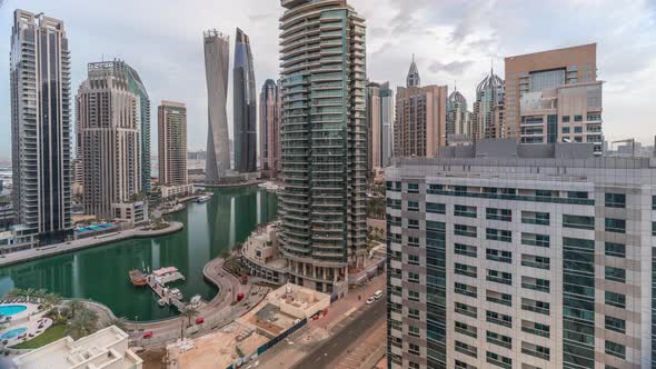 Aerial View of Dubai Marina Residential and Office Skyscrapers with Waterfront Timelapse