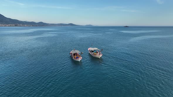 Fishing boat goeas to sea aerial view Turkey Alanya 4 K