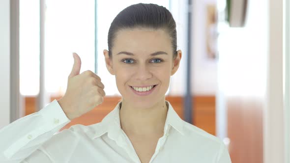 Thumbs Up by Woman, Indoor