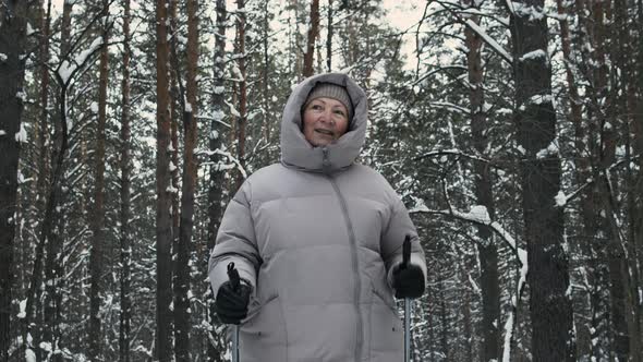 Mature Woman Doing A Nordic Walk