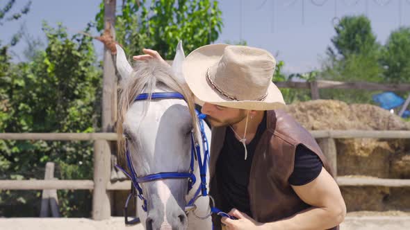 The man who loves the mane of his white horse.