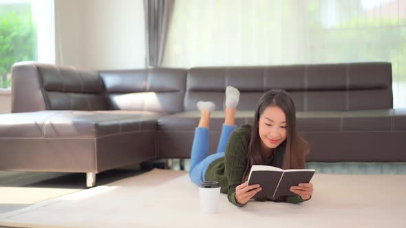 Young asian woman read book