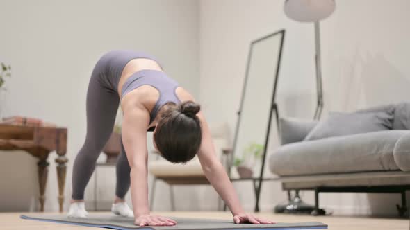 Indian Woman Doing Yoga on Yoga Mat at Home