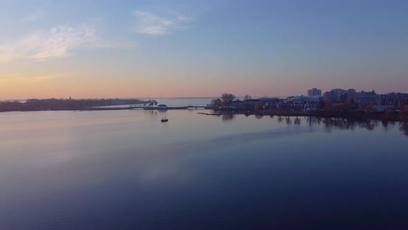 aerial peaceful sunrise over a lake