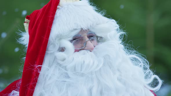Close up of Santa Claus enjoying the cold weather alt