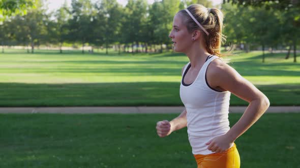 Young woman jogging in park