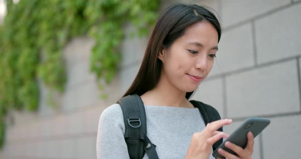 Woman Working on Smart Phone in The Park