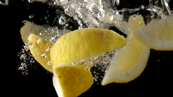 Fresh lemon splash on water