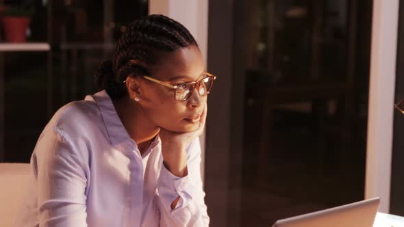 Businesswoman working on laptop