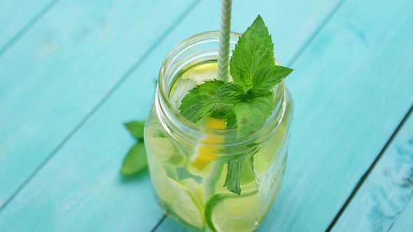 Refreshing Lemonade on Blue Table 