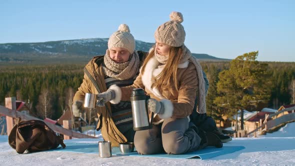 Warming Up with Hot Tea at Winter Day