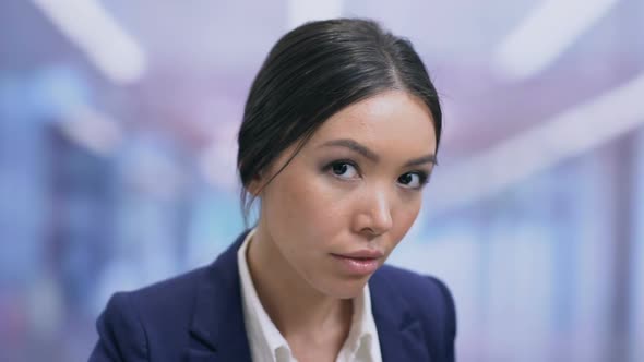 Busy Female Employee Smiling on Camera Close-Up, Professional Company Consultant