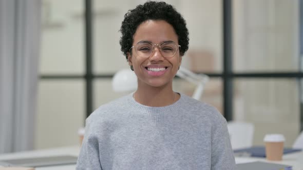 Portrait of Young African Woman Smiling at Camera 