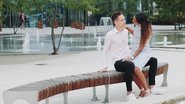 Panning Shot of a Beautiful Multiracial Couple Spending Time Together in a Romantic Place Outdoors