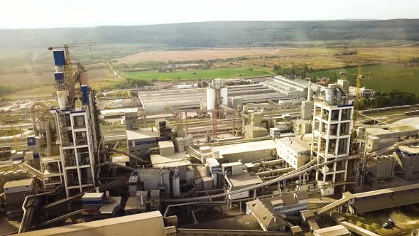 Aerial view of cement plant factory at industrial production area.