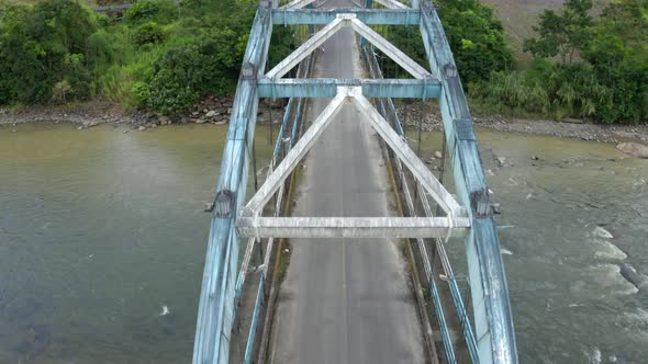 Aerial top view of a metal truss bridge