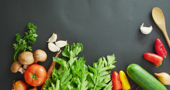 Video of fresh vegetables with copy space over grey background