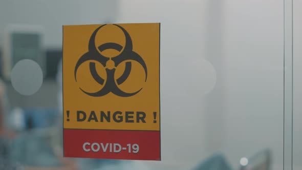 Close Up of Danger Sign Against Coronavirus Outbreak