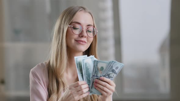 Joyful Rich Girl Counting Cash in Office Successful Caucasian Lady Businesswoman Getting Bundle of