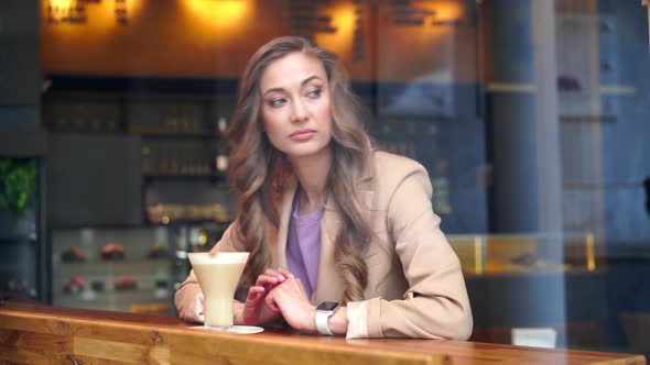 Business Woman Sitting Cafe Behind Window Waiting Business Partner Nervous Looking Watch