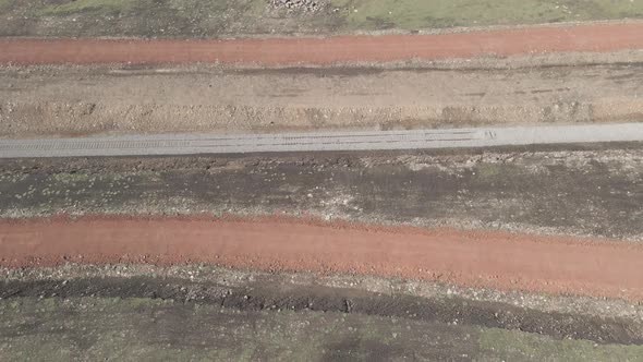 Moving along railroad tracks. Aerial view of Railroad emergency stop track in Trialeti, Georgia