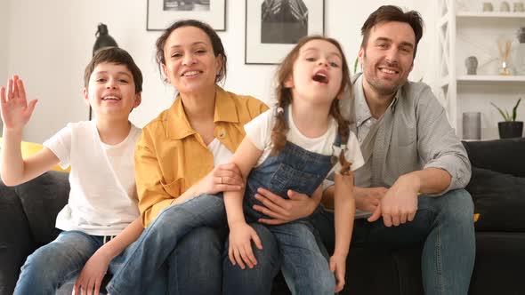 Video Connection with Cheerful Family of Four