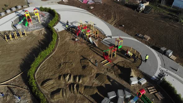 Playground in the park. Aerial view of the construction site.