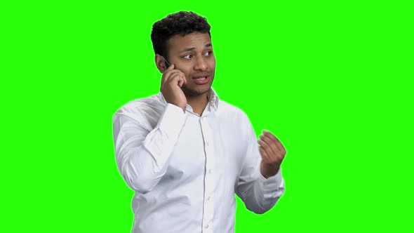 Businessman Explaining Something on the Futuristic Phone