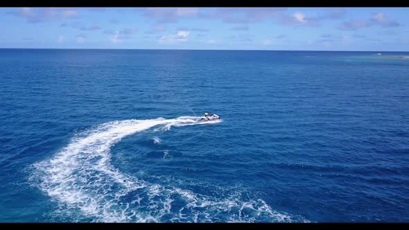 Aerial seascape of paradise island beach trip by blue lagoon and white sandy background of a dayout 