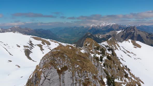 Aerial Drone View on Snowy Peaks of Swiss Alps. Switzerland. Rochers-de-Naye Mountain Peak.
