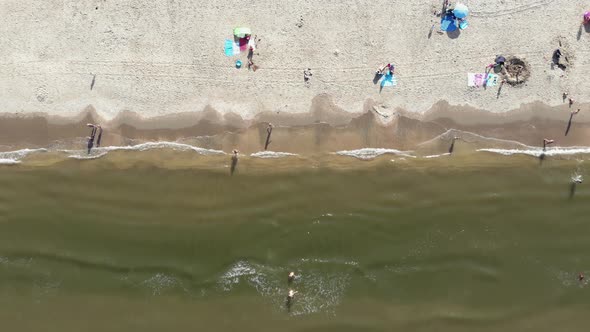 Wijk aan Zee shoreline with people enjoying the beach in North Holland, the Netherlands