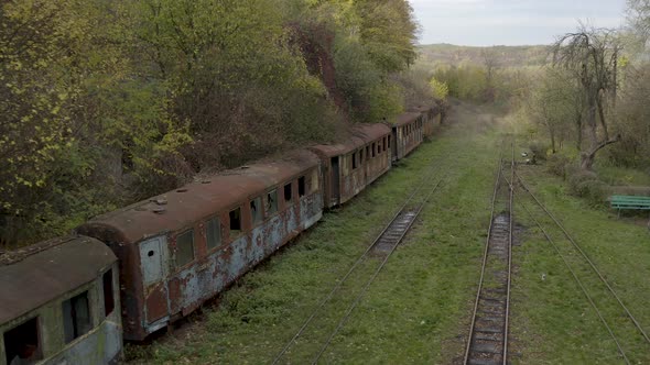 Drone Flight Over the Old Rusty Wagons of the Narrow Gauge Railway