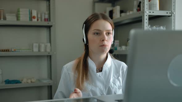 Woman Pharmacist Talking with Potential Customer As Online Support