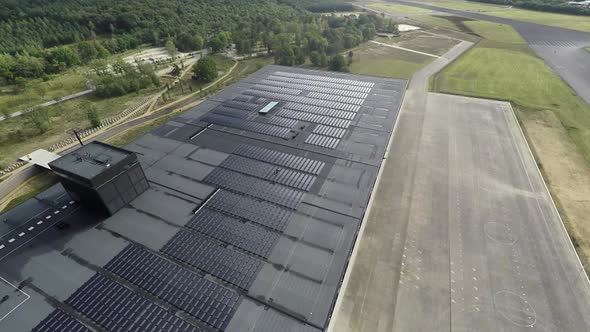 Solar panels on large building.