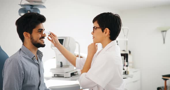 Girl Woman in Ophthalmology Clinic for Diopter Detection