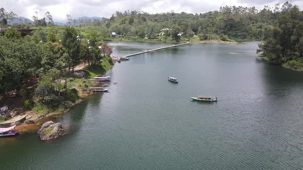 Aerial view of lake side with park and mountain in Bandung, Indonesia