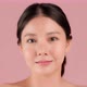 Close up Beauty shot of Beautiful Asian girl looking at camera isolated on pink background - VideoHive Item for Sale